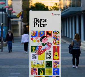 Cartel y adaptaciones Fiestas del Pilar 2025 Vera Galindo. Ilustradora y diseñadora de Zaragoza.